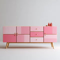Aparador con puertas y cajones de tonos rosas - rosa